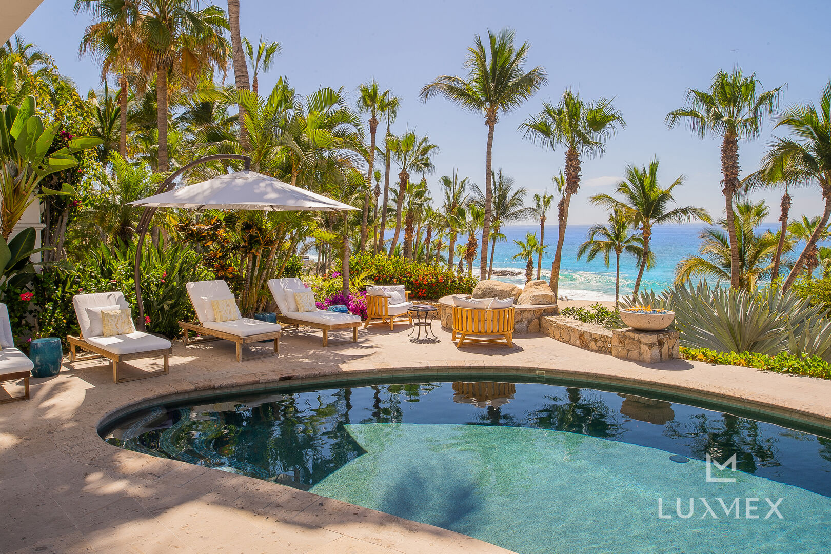The lounge chairs and pool at the Villa Sirena in Los Cabos