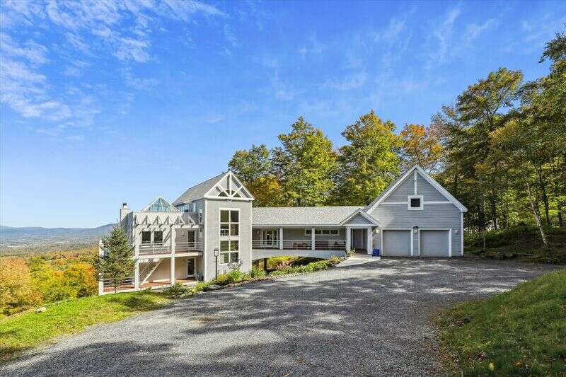 Your stay in this exquisite Stowe Hollow neighborhood home will be the most fondly remembered of family vacations for years to come! With a gorgeous skylight cupola at its apex, the main room offers truly sweeping views of Mount Mansfield almost anywhere you turn. Complete with a gas fireplace to keep the Vermont weather outside, a bright kitchen with a separate large dining area and bar, and many different seating options on a plush sectional surrounding the fireplace, this home is ready for your family's special celebration. Multiple areas of this expansive home also offer space for both gathering and private time. As many as eight guests can comfortably relax in the high style of this well thought out home. With 3 bedrooms and 4.5 bathrooms there are plenty of options for everyone to have a restful vacation. Don't forget to step outside this impressive home to take in the fresh mountain air from seemingly endless vantage points from any one of this home's multiple decks. When you are here, you truly are In the Clouds! 
