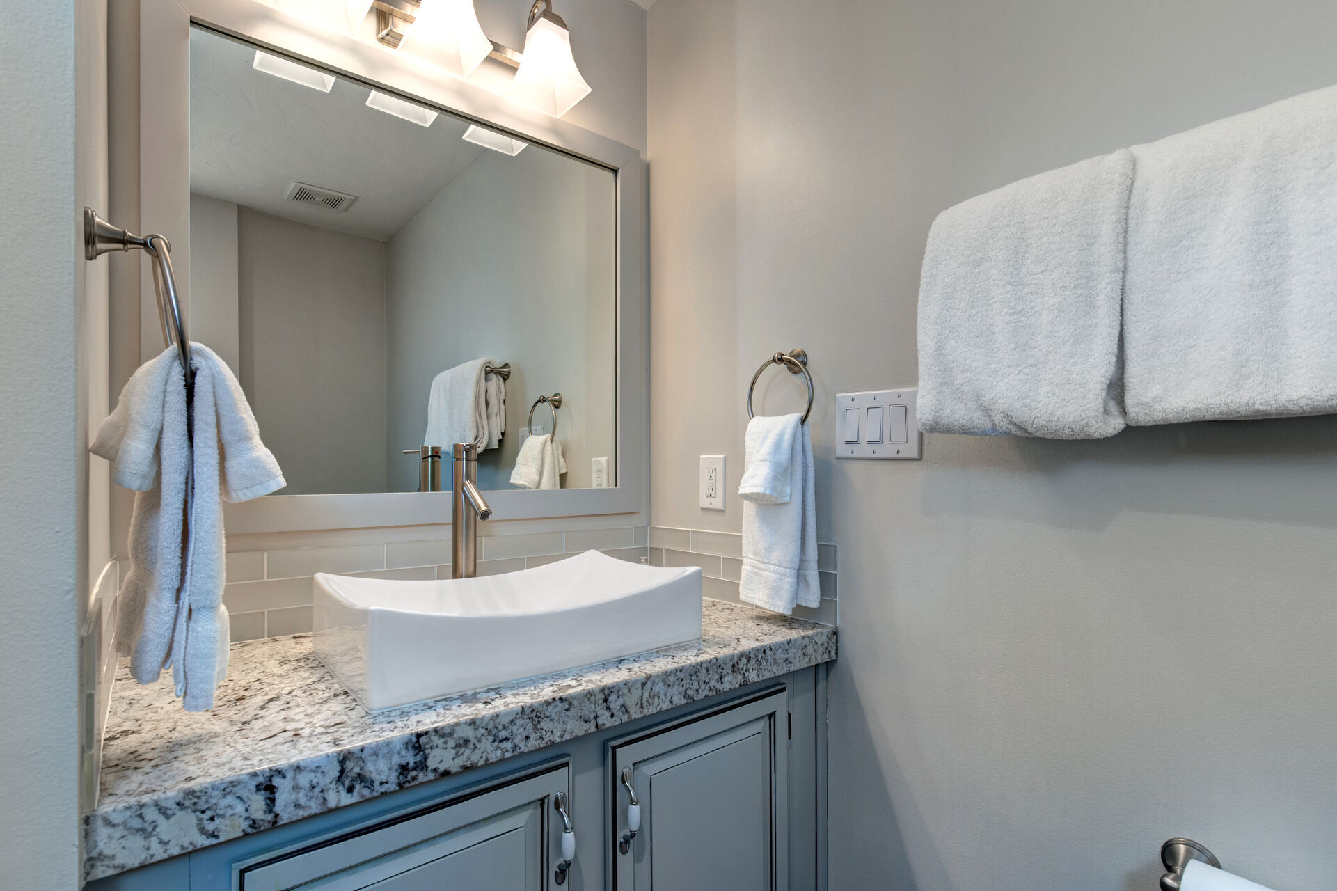 Bathroom 2 Bathroom with Shower, Granite Counters, Raised Vessel Sinks and Washer/Dryer