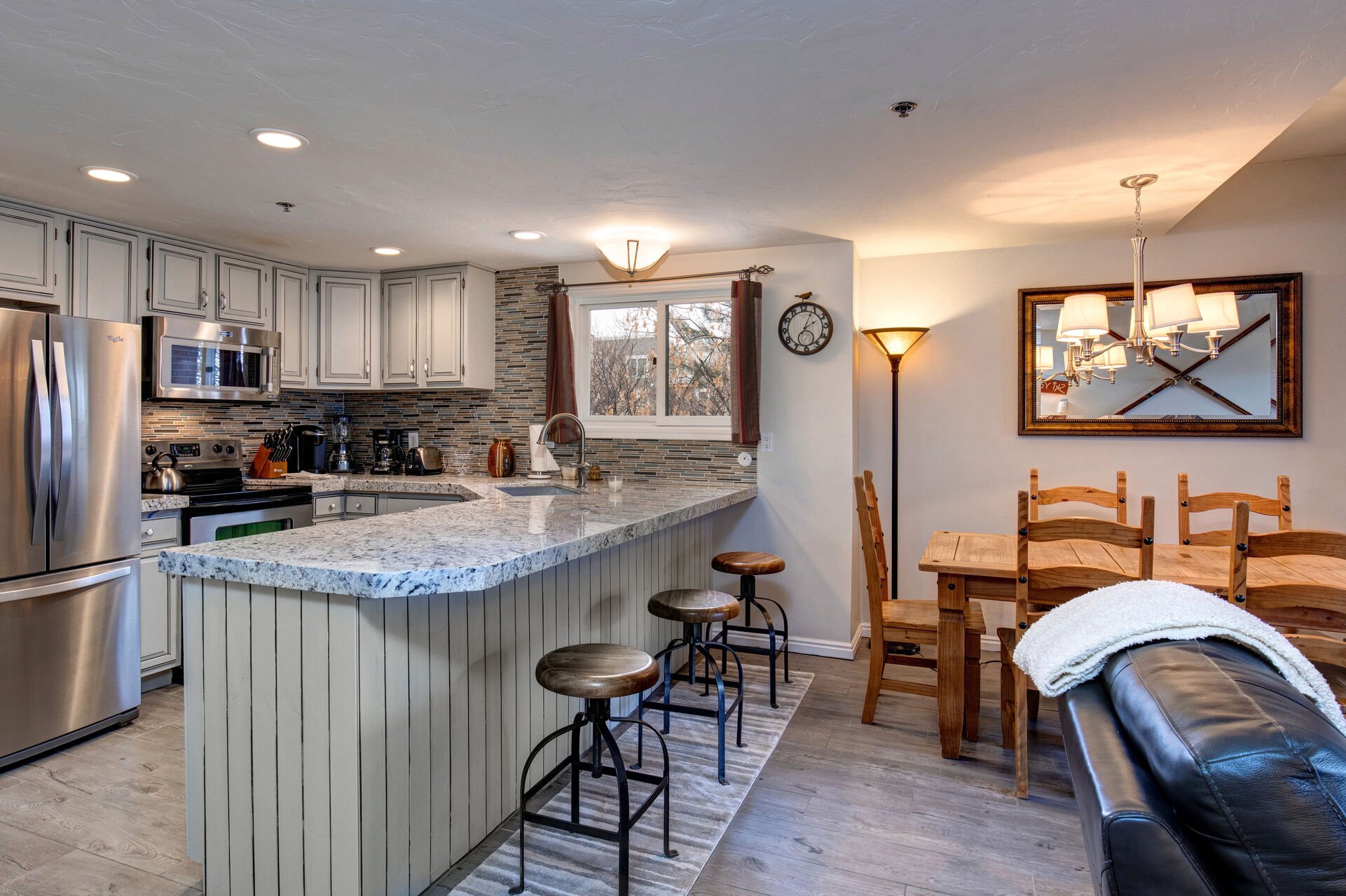Fully Equipped Kitchen with Granite Counters, and Stainless Steel Appliances