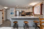 Kitchen with Granite Counters, Stainless Steel Appliances and Counter Seating for 3