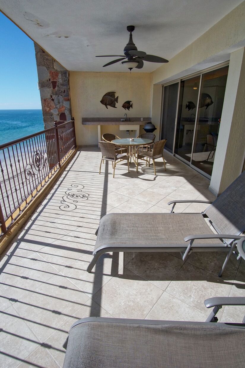 The patio overlooks the Sea, and has chaise lounges as well as a dining table for 4.