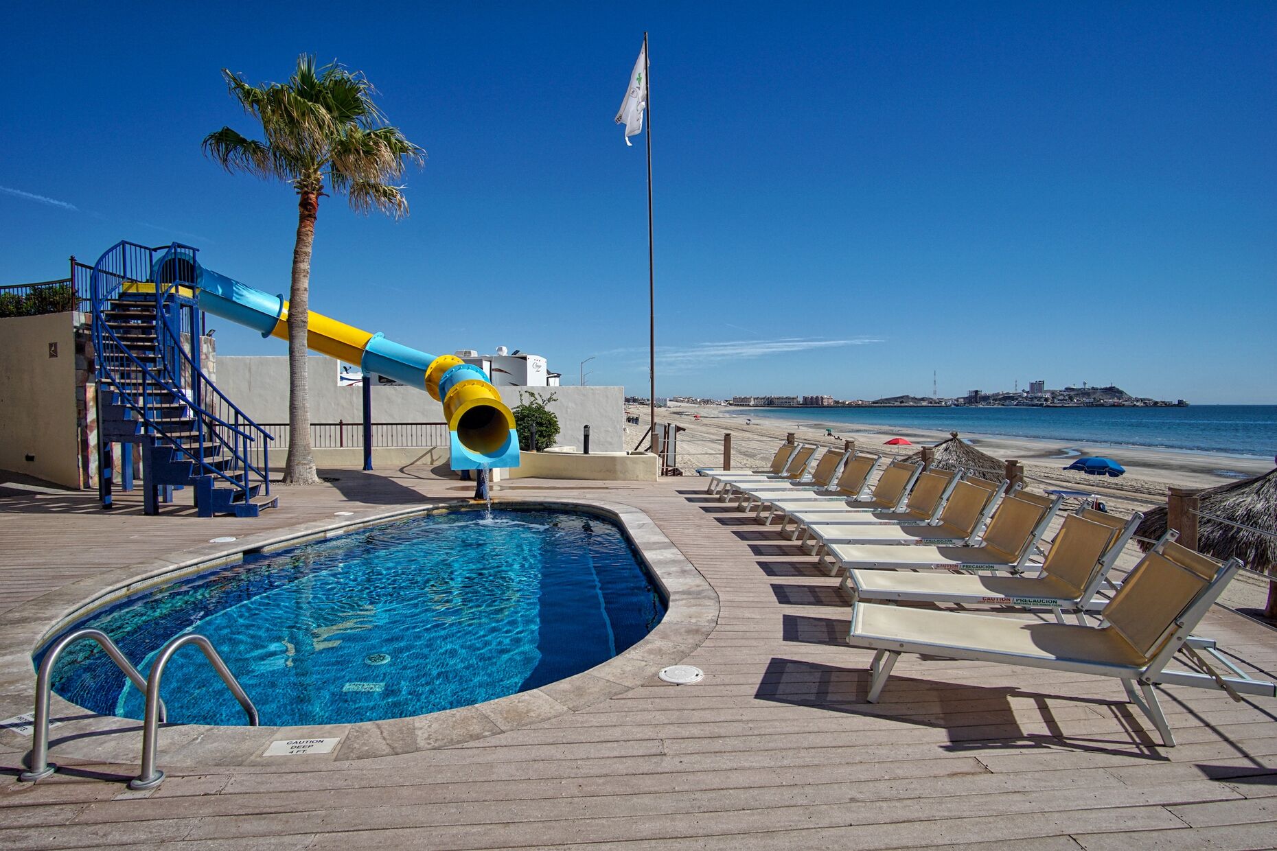 An additional kids pool, with water slide.