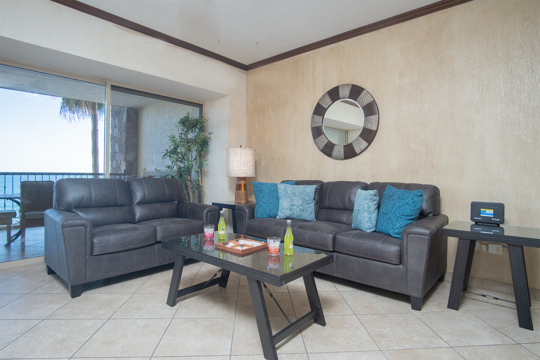 The living room has comfortable leather sofas.