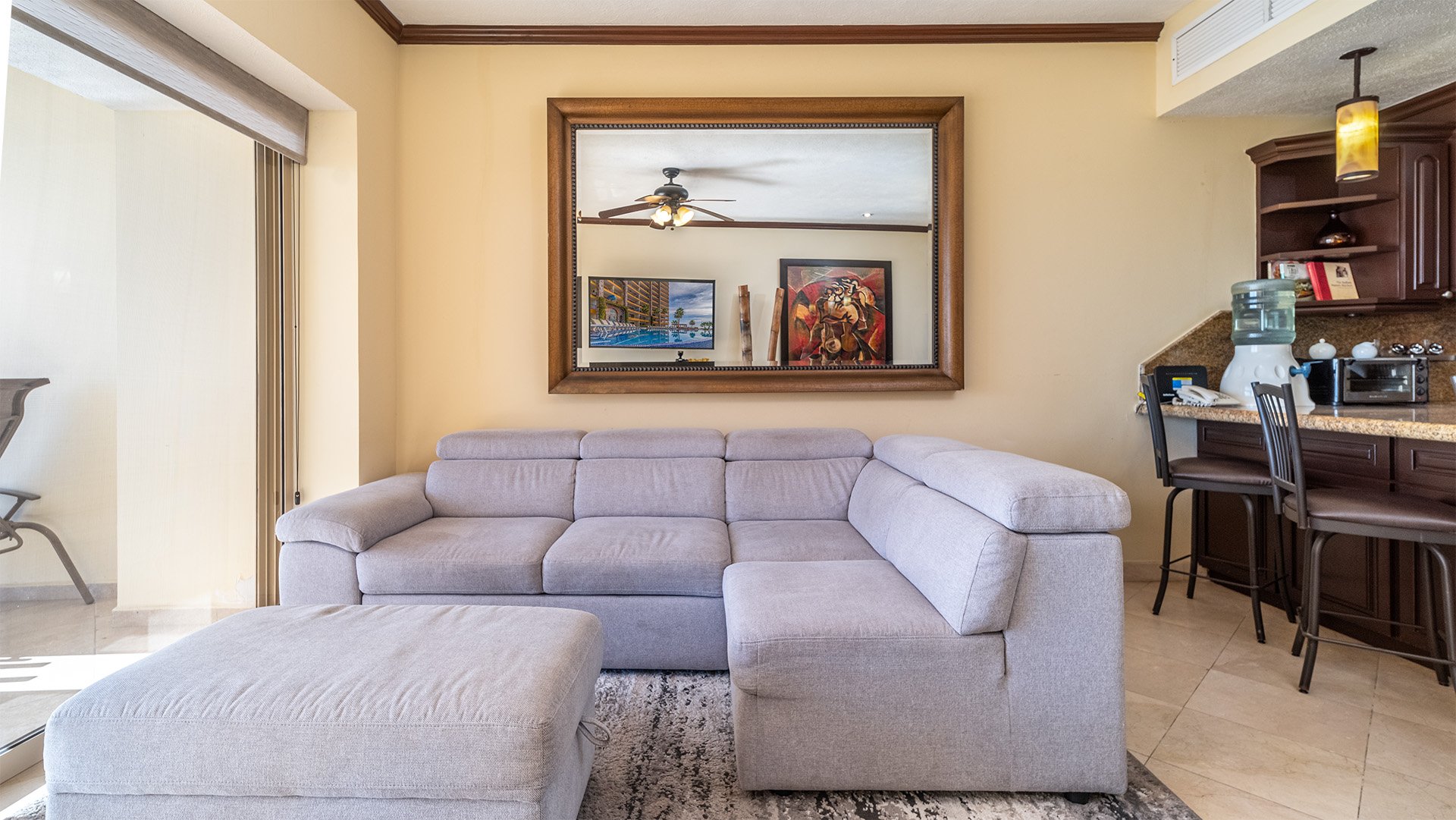 Sofa and kitchen counter with seats