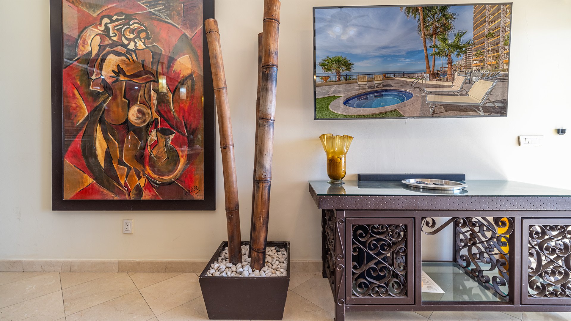 close up of the TV, and wall art