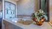 The raised jacuzzi tub presents pure elegance at Sonoran Sky 702.