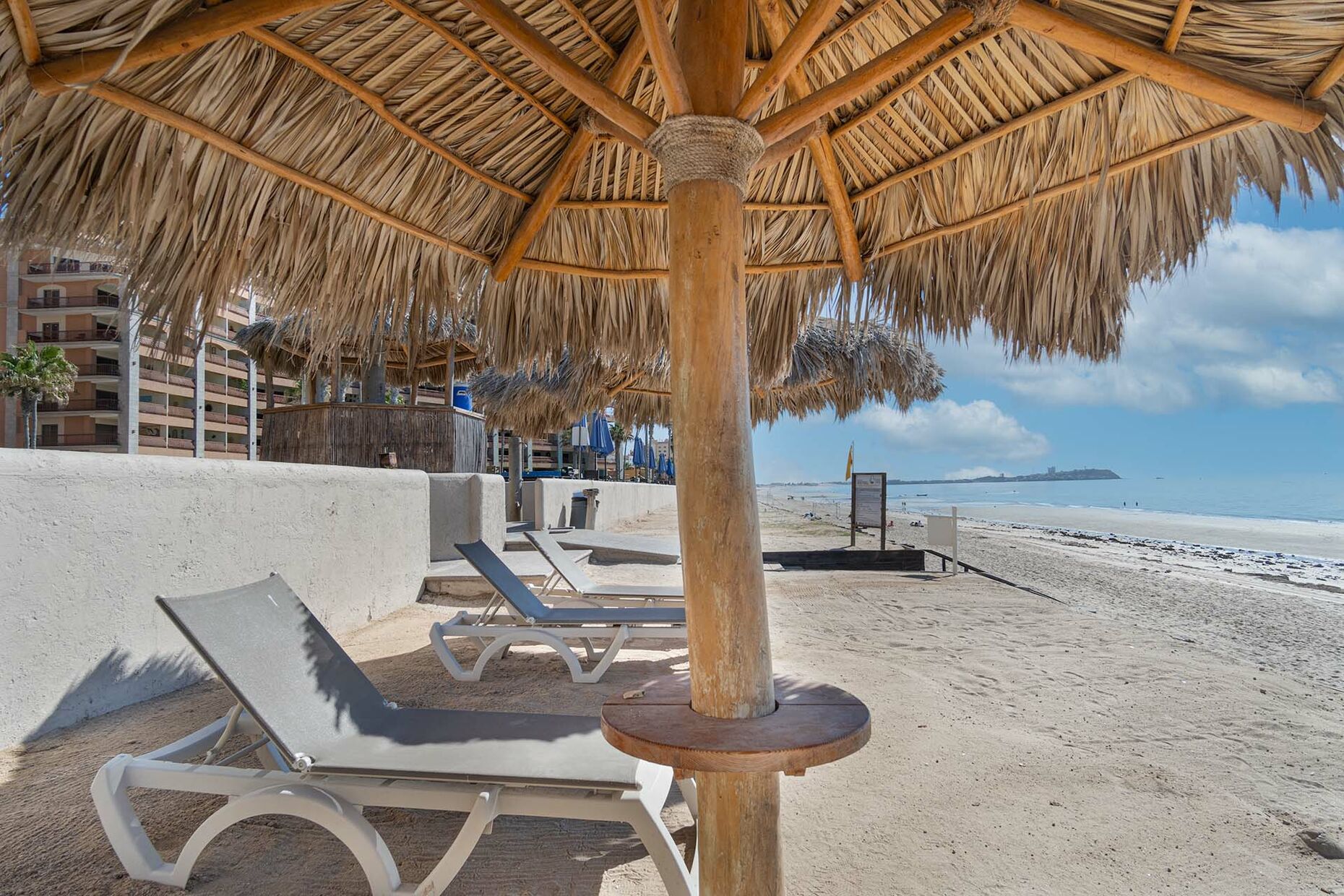 A shade palapa protects you for a day at the beach