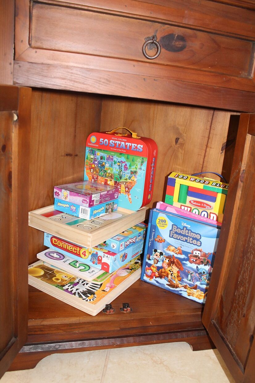 Main Room - stocked with kids games, puzzles, books. Full size pack-n-play is stored in Master BDRM closet