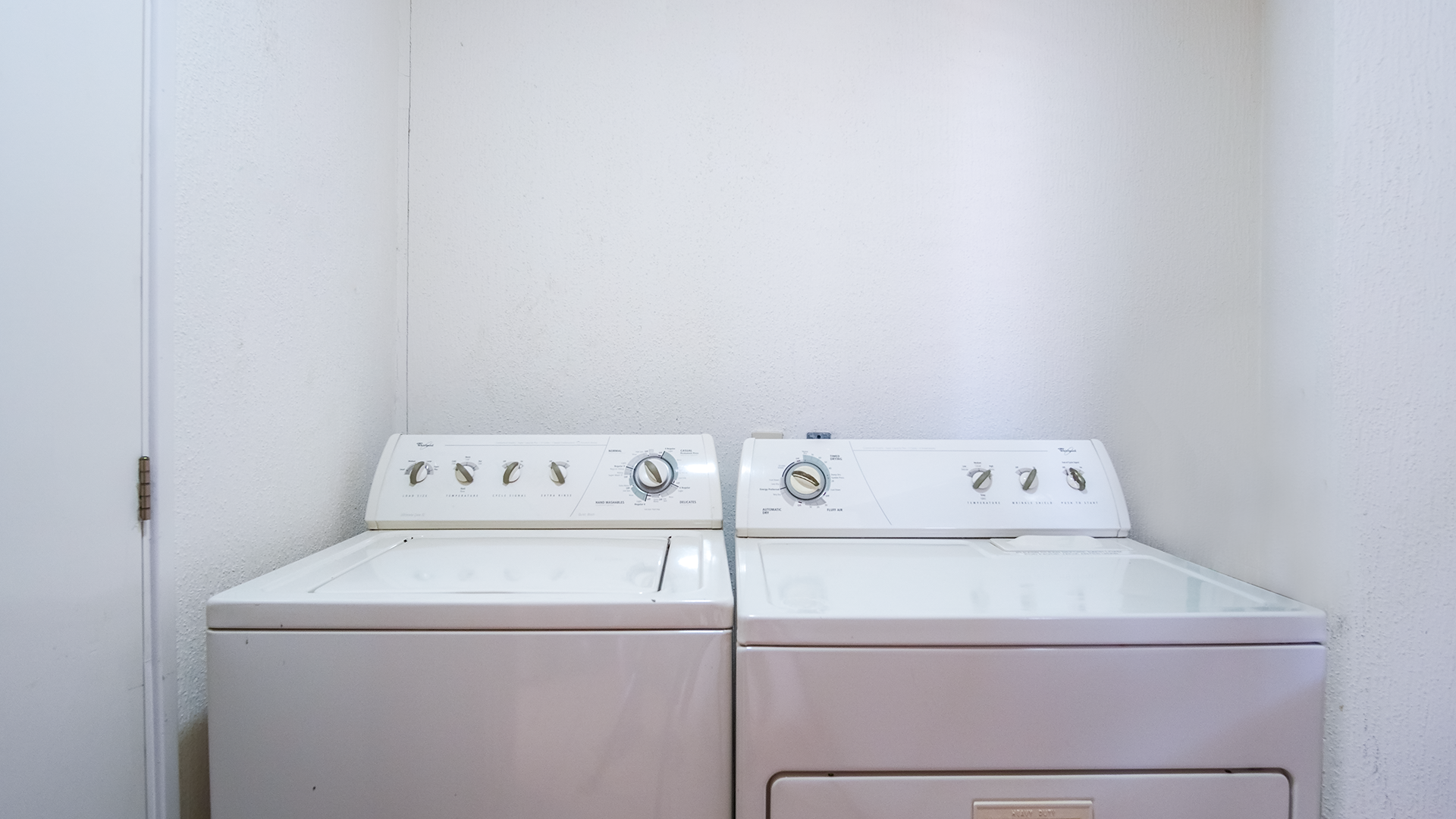 washer and dryer in utility room