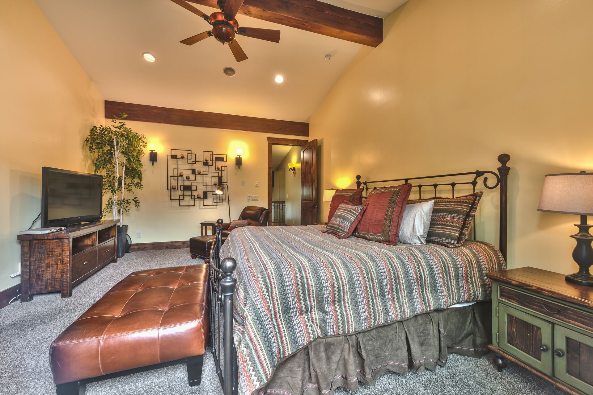 Grand Master Bedroom with King Bed, Gas Fireplace, Smart TV, Private Deck, Private Bath