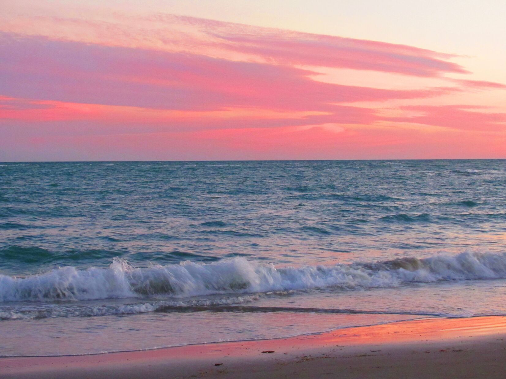 Gentle waves at sunset on Playa Encanto beach