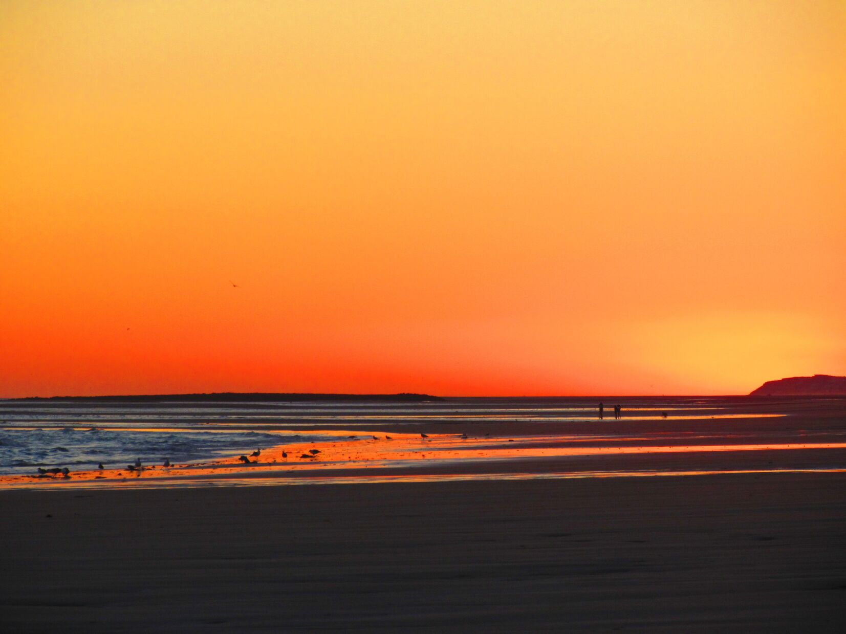 Western light after sunset on Playa Encanto beach