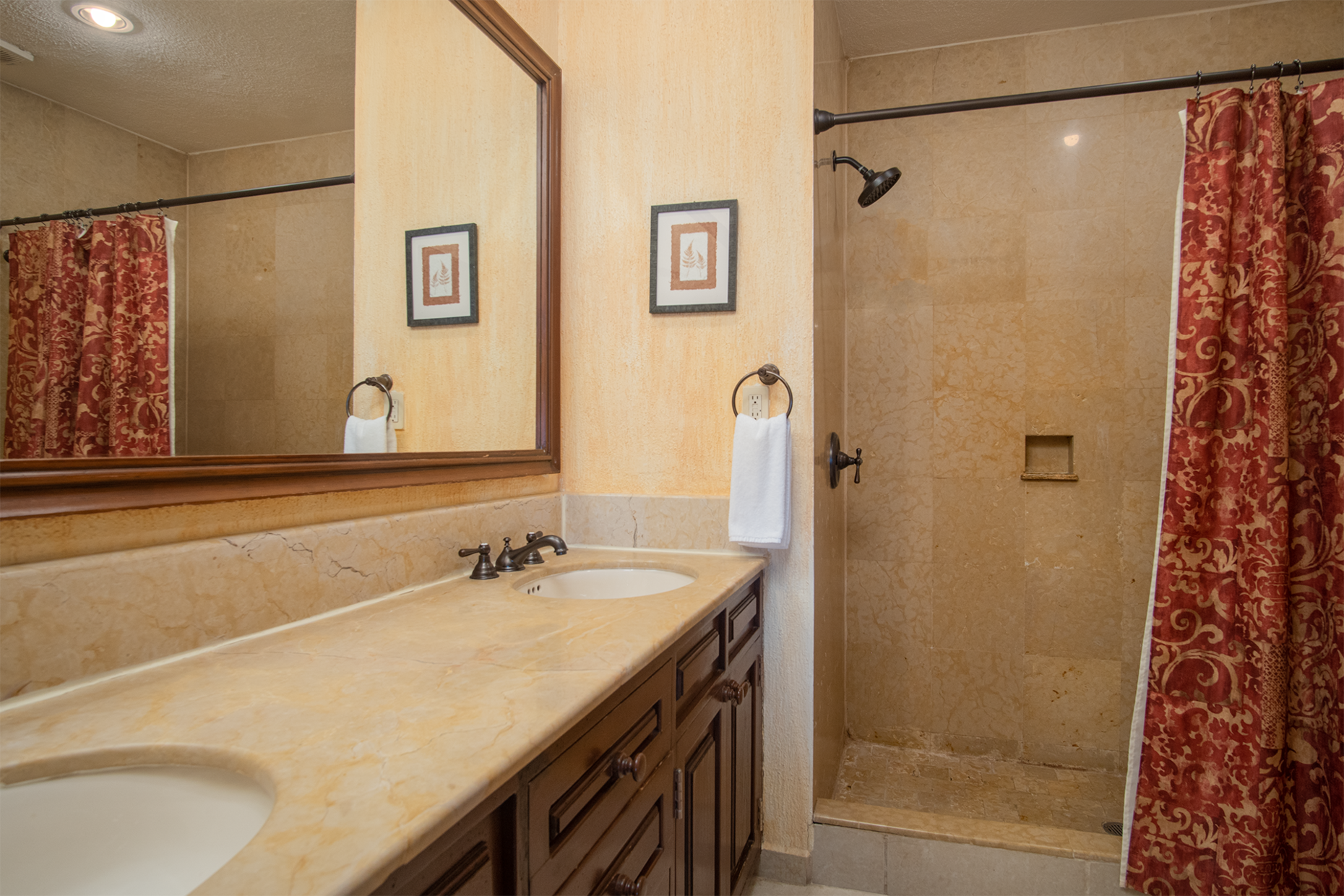 main bathroom with shower and vanity