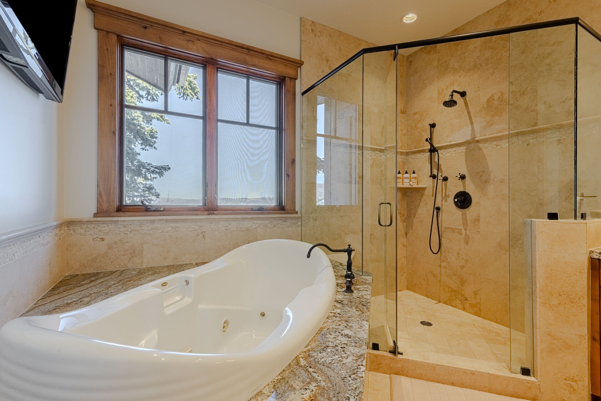 Master Bath with a Jetted Tub and Shower with Multiple Shower Heads