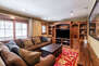 Lower Level Family Room with Gaming Table, Smart TV + Surround Sound
