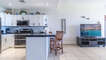 Full kitchen has all needed large appliances, small appliances, cookware, coffee maker and Keurig.
