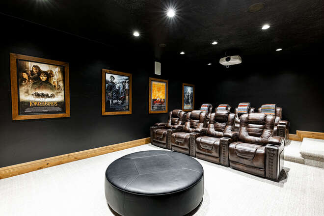 Theater Room with 8 Recliner Chairs and Wet Bar with a Mini Fridge
