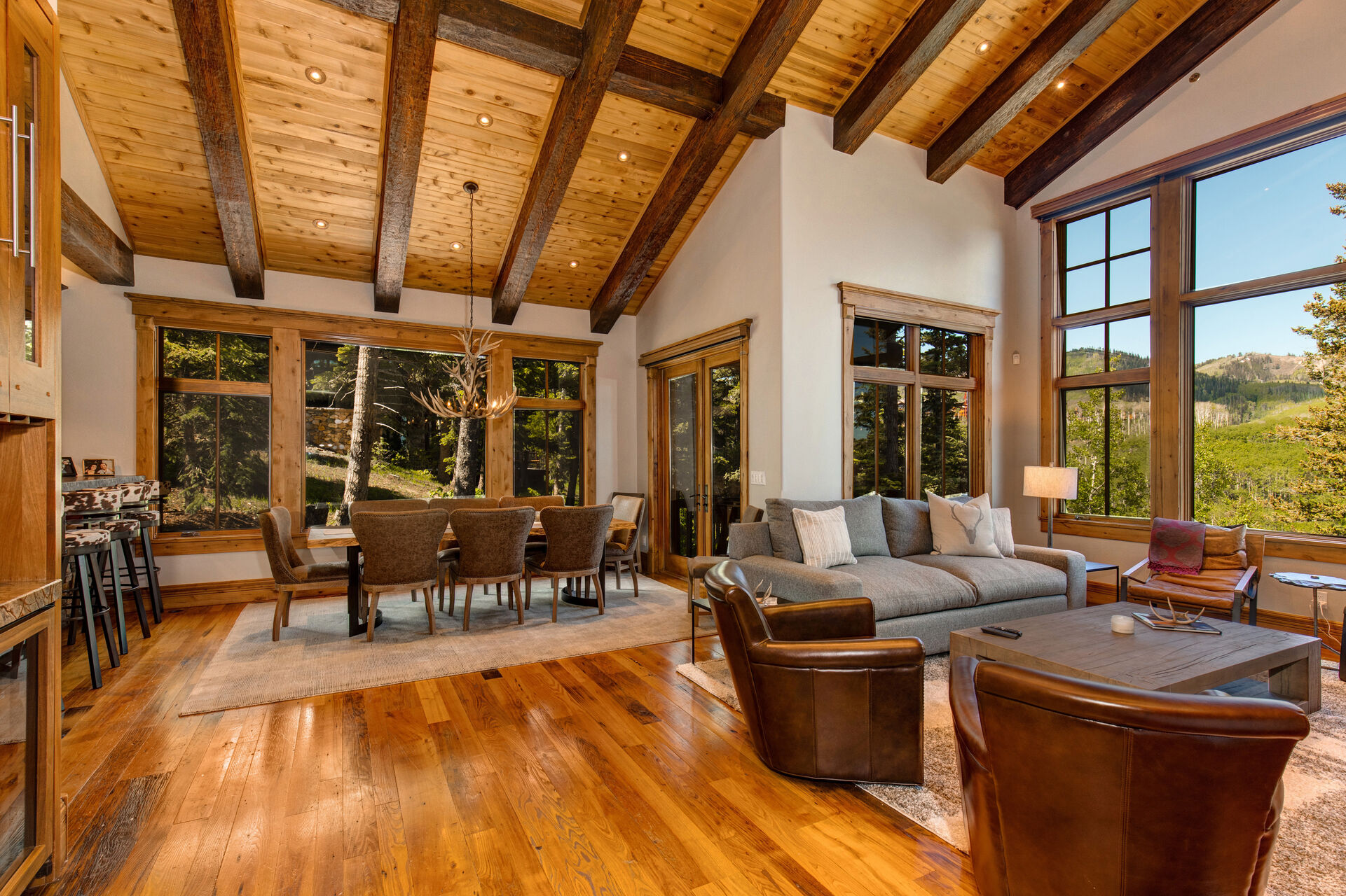 Upper Level Living Room with Fireplace and Deck Access, Beautiful Views out Large Windows