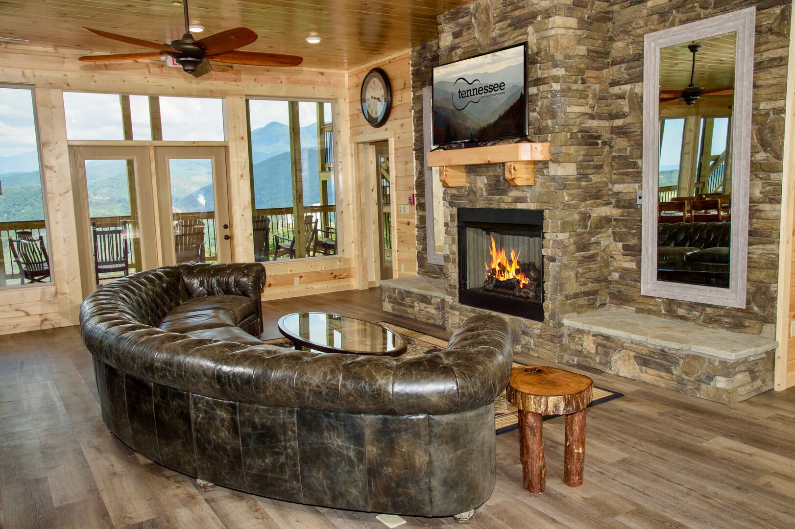 Living Area on the Main Level with TV and Fireplace