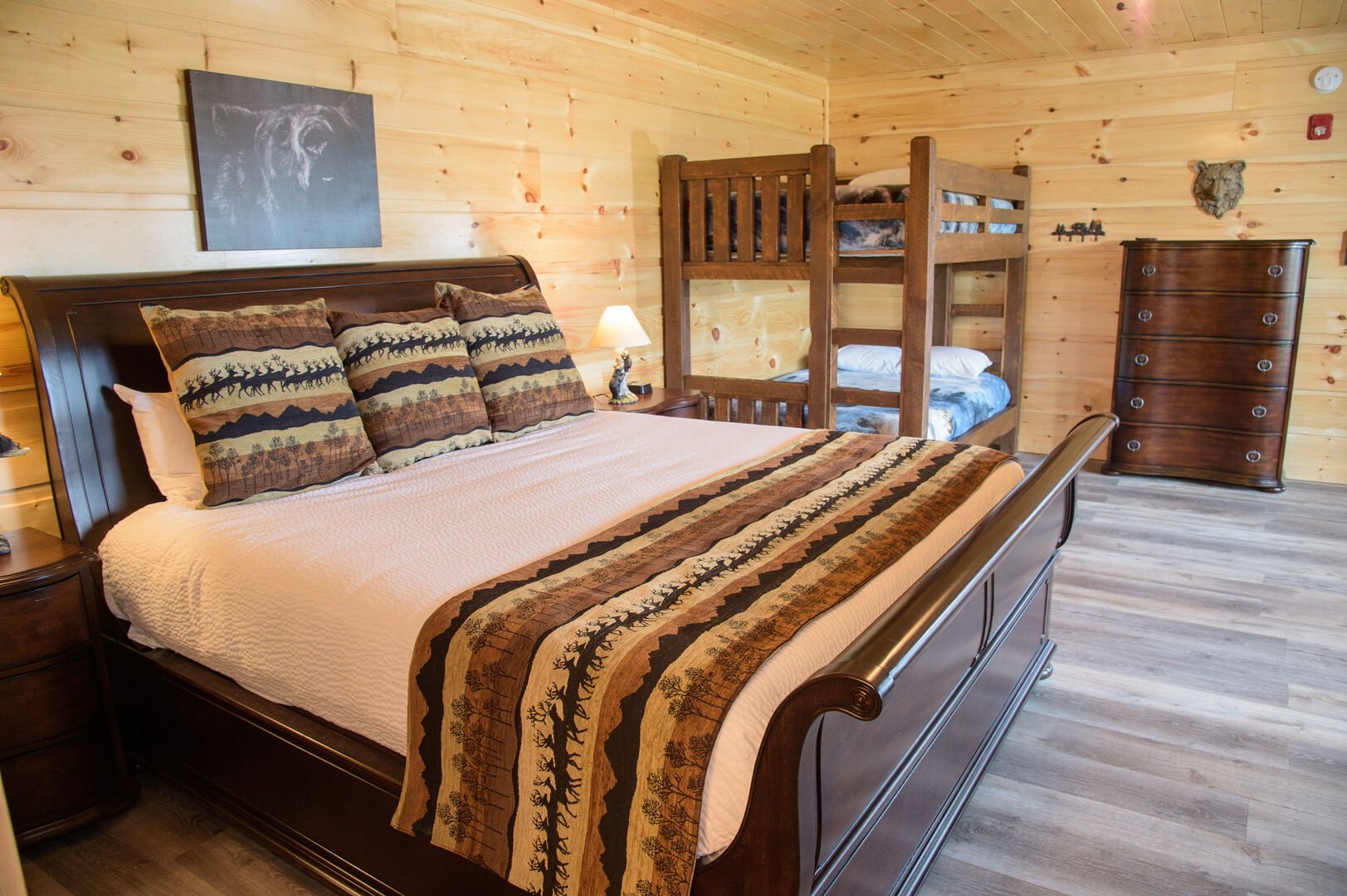 Bedroom with a King Bed, Bunk Beds,TV, fireplace, & private bathroom