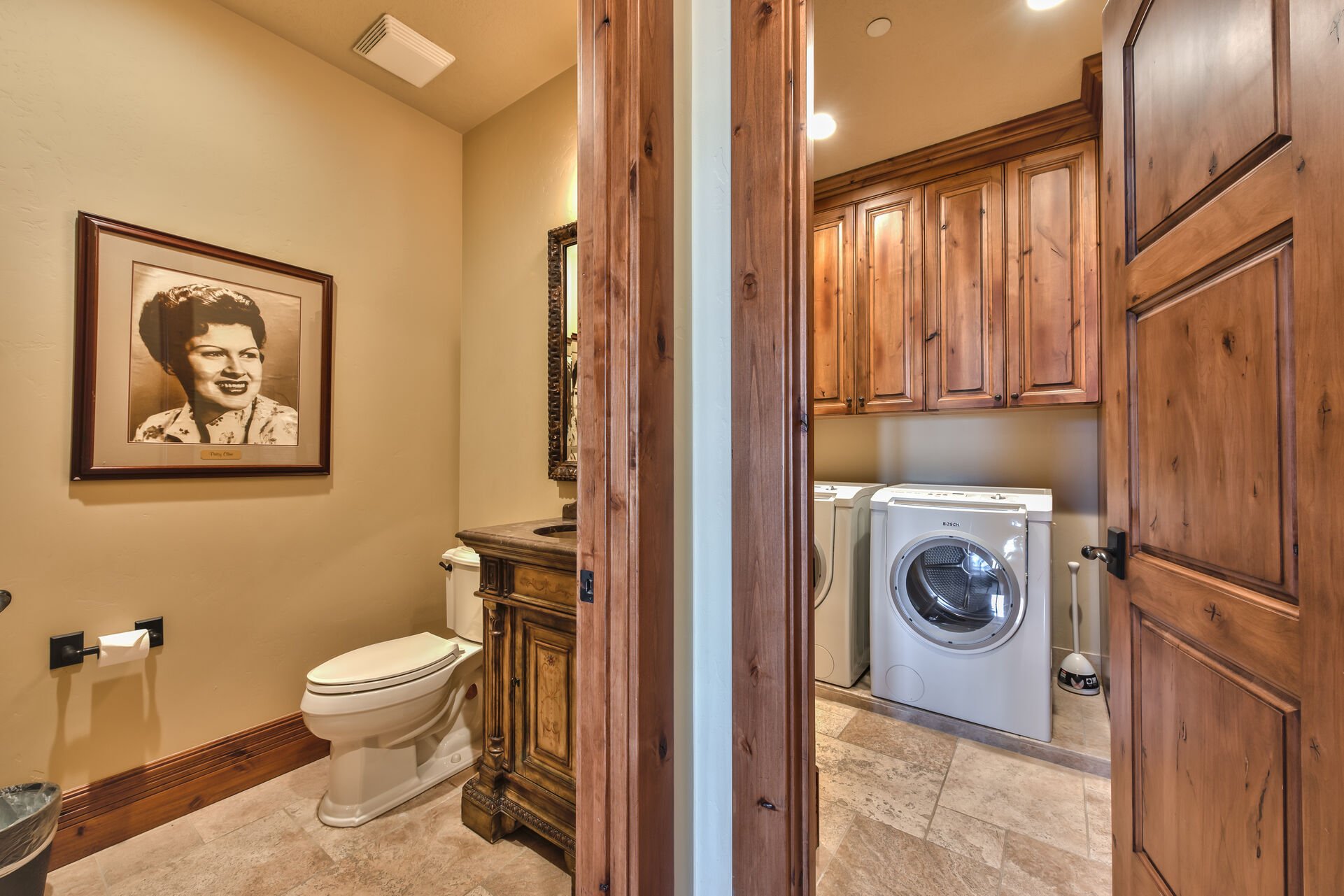 Main Level Powder Room and Laundry with Bosch Washer and Dryer