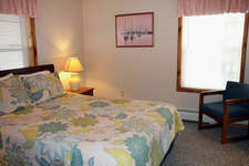 Master bedroom has a queen size bed attached to a shared bathroom with the 2nd bedroom