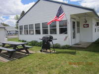 Cottage is located close to the pool, laundry room and office. Nice yard with picnic table and private grill.