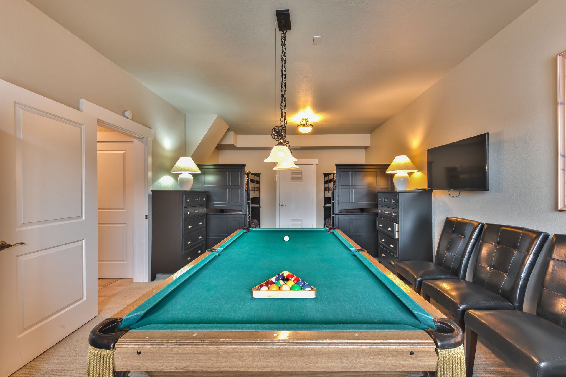 Bunk Room/Game Room with two sets of twin bunk beds and pool table
