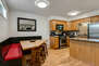 Fully Equipped Kitchen with Stainless Steel Appliances, Granite Countertops and Bar Seating for 2