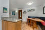 Fully Equipped Kitchen with Stainless Steel Appliances, Granite Countertops and Bar Seating for 2