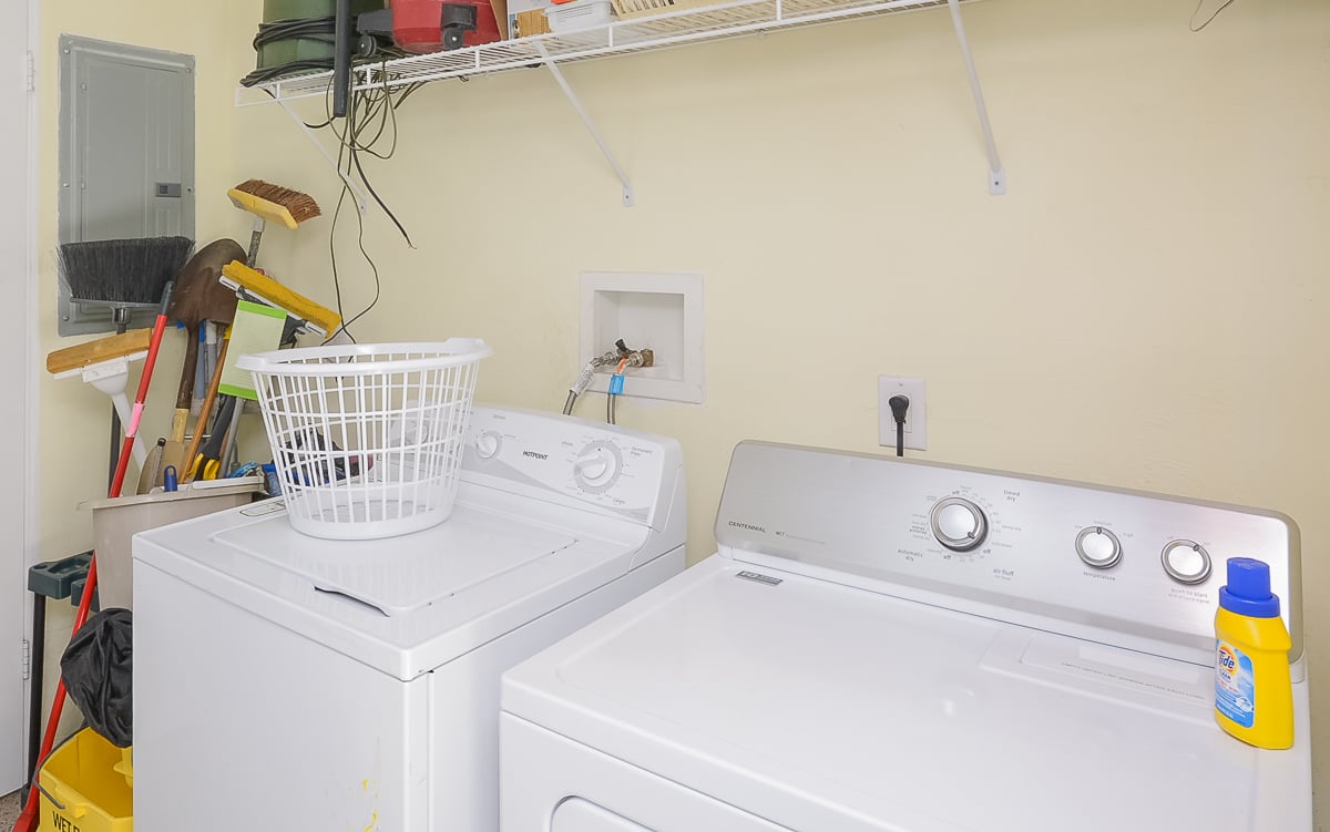 Laundry room with full sized washer and dryer.