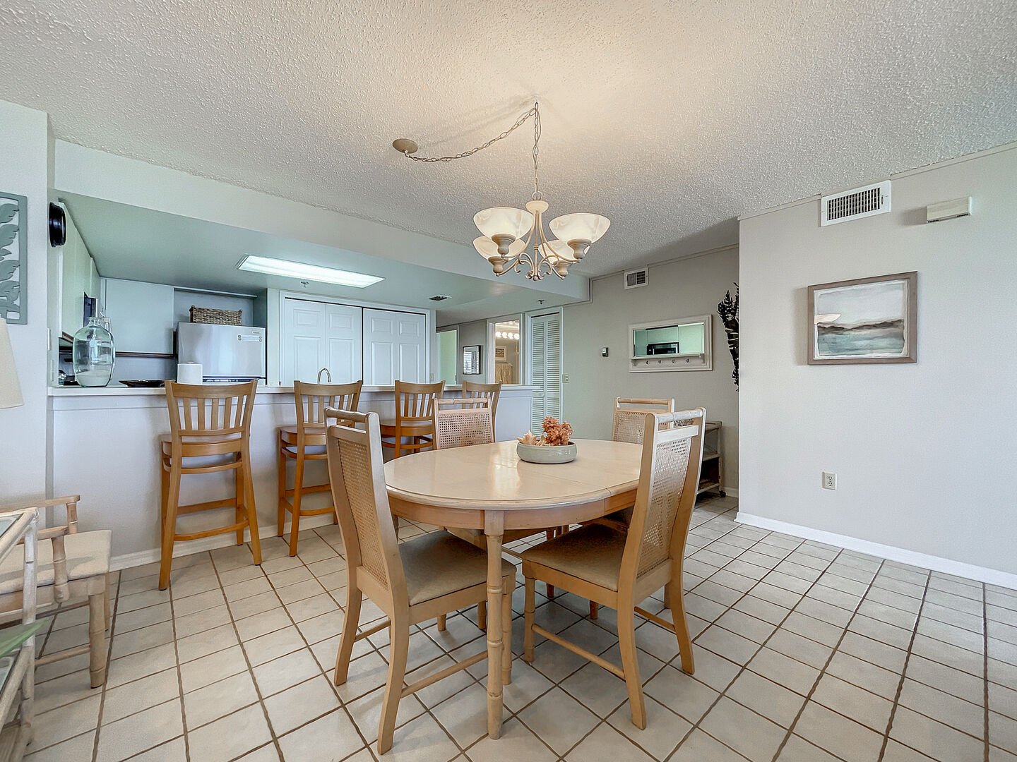 Appreciate mealtimes with family and friends in the ocean view dining room featuring seating for 4.