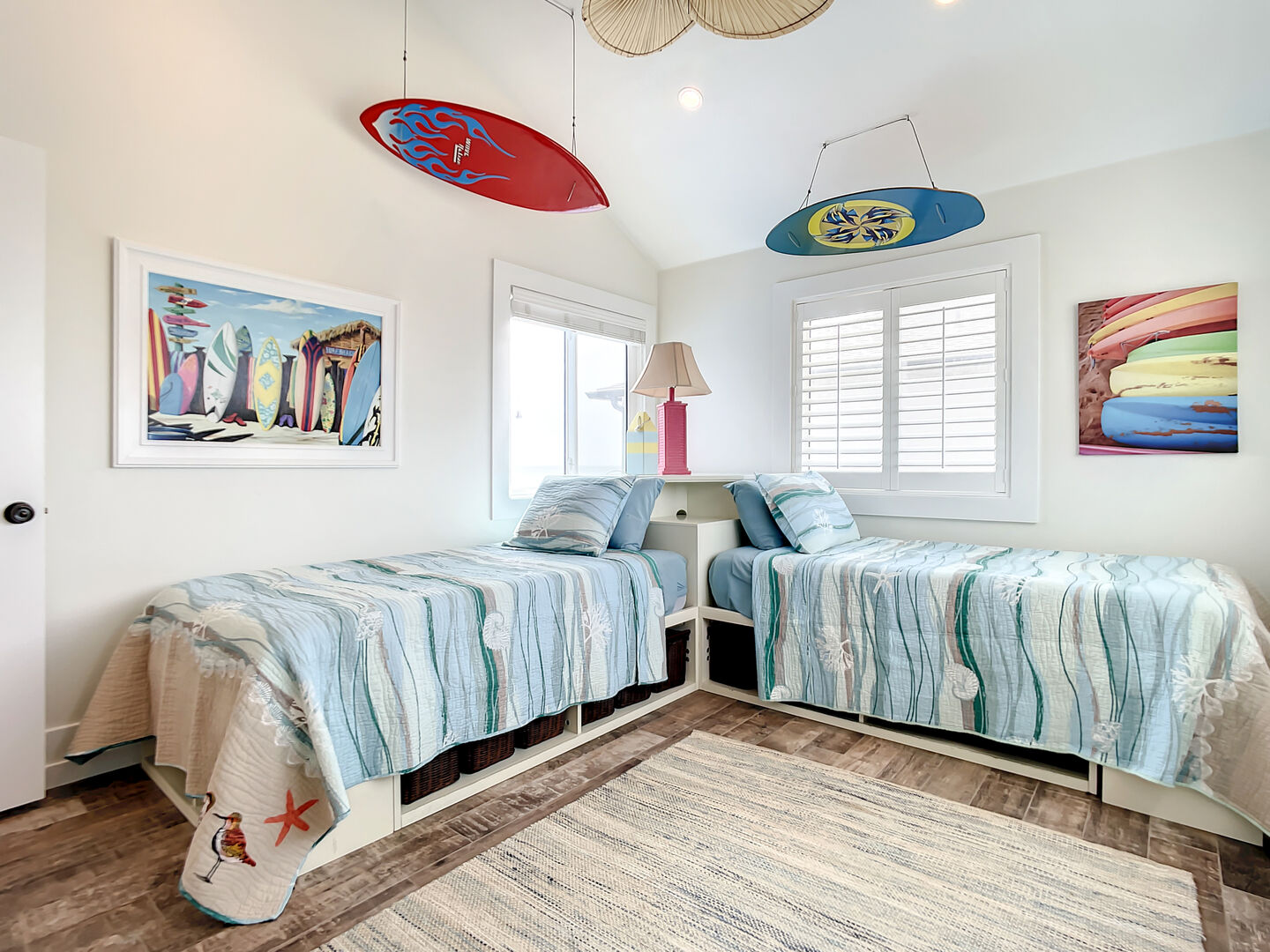 3rd Bedroom with Twin Bed and Surfboard Decorations.
