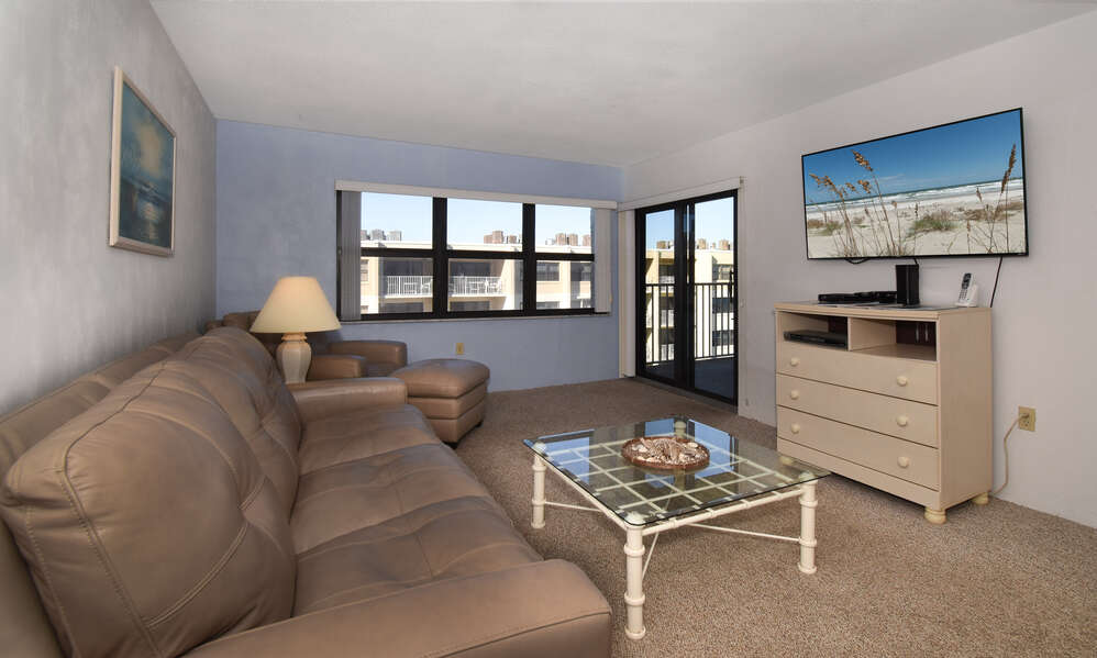 Ocean View Living room with Flat Screen TV and Leather Seating