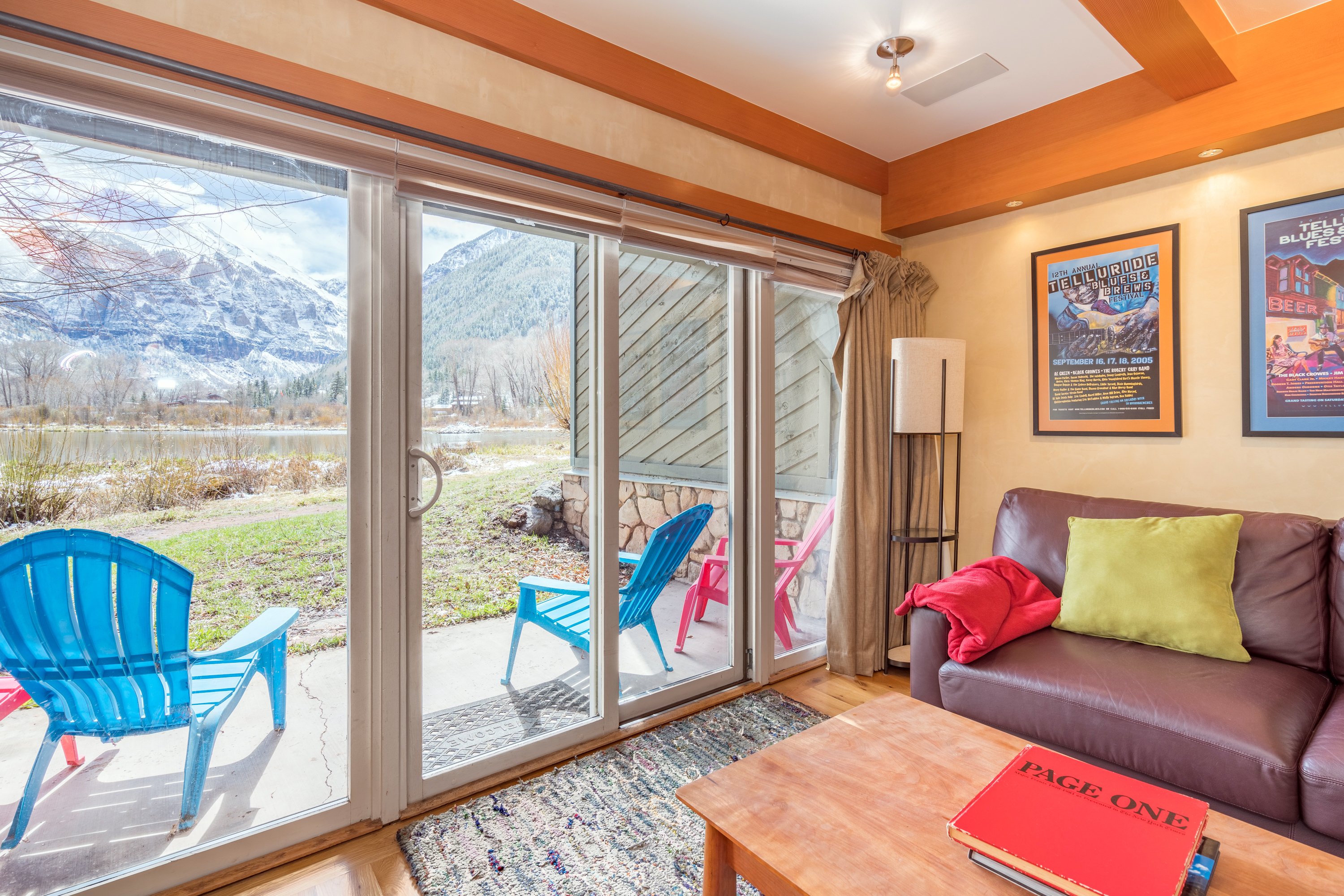 Sofa, Coffee Tabe and Sliding Doors to the Patio with Mountain Views