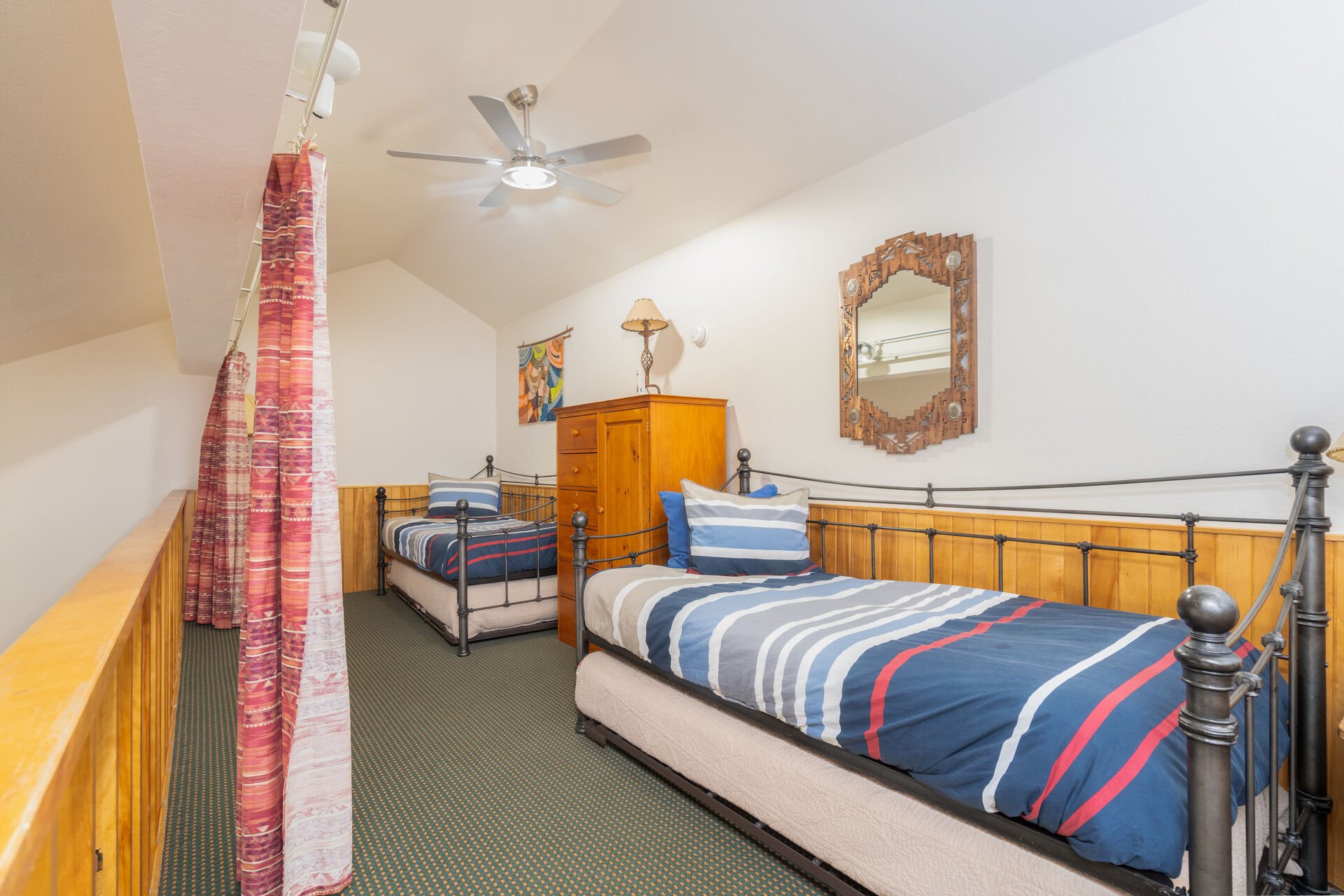Loft room with two trundle beds
