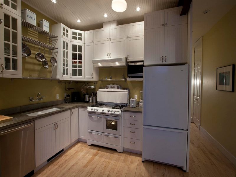 Kitchen with a refrigerator and an oven