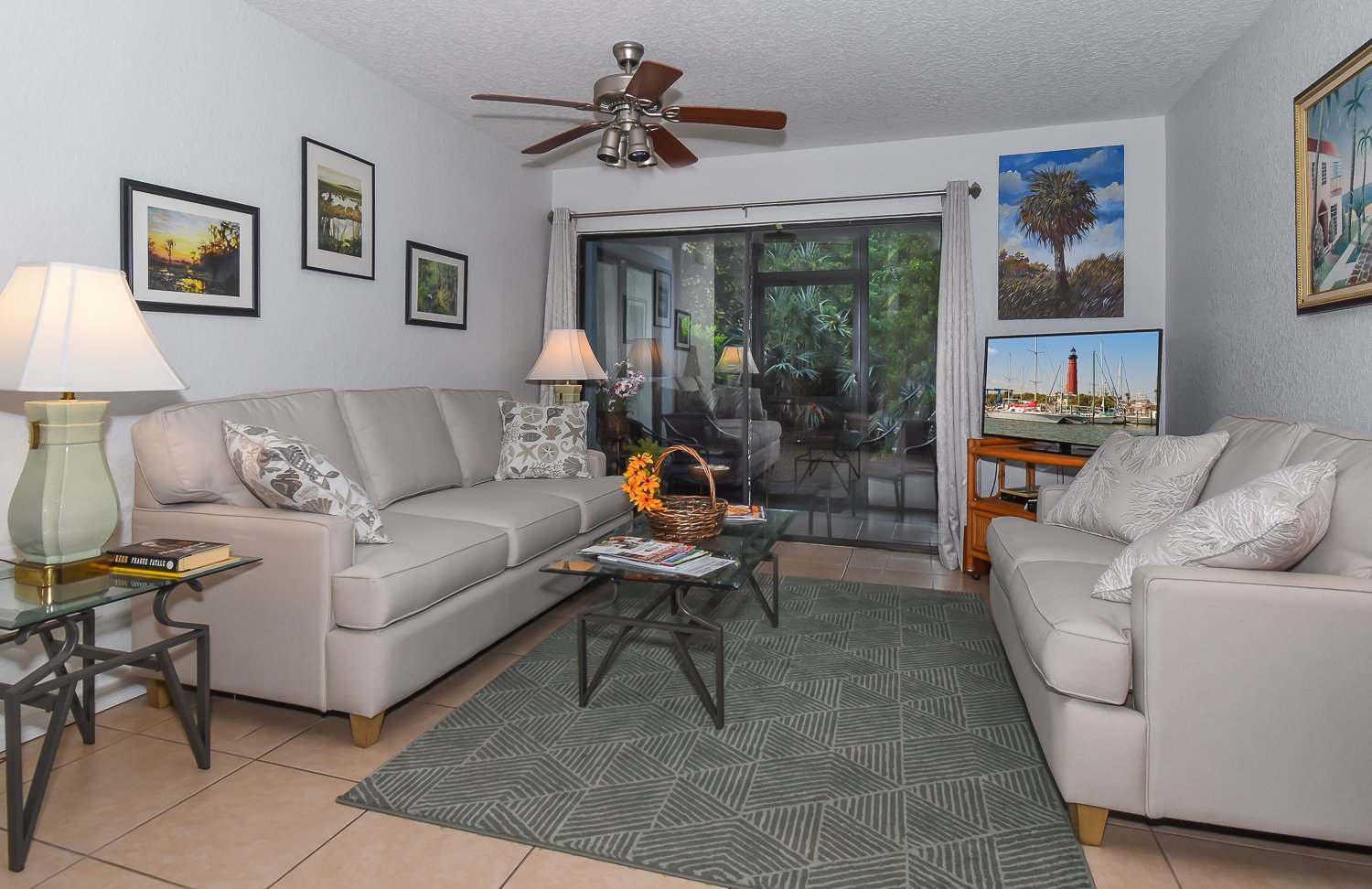 Living room with couches in this new Smyrna Beach vacation rental.