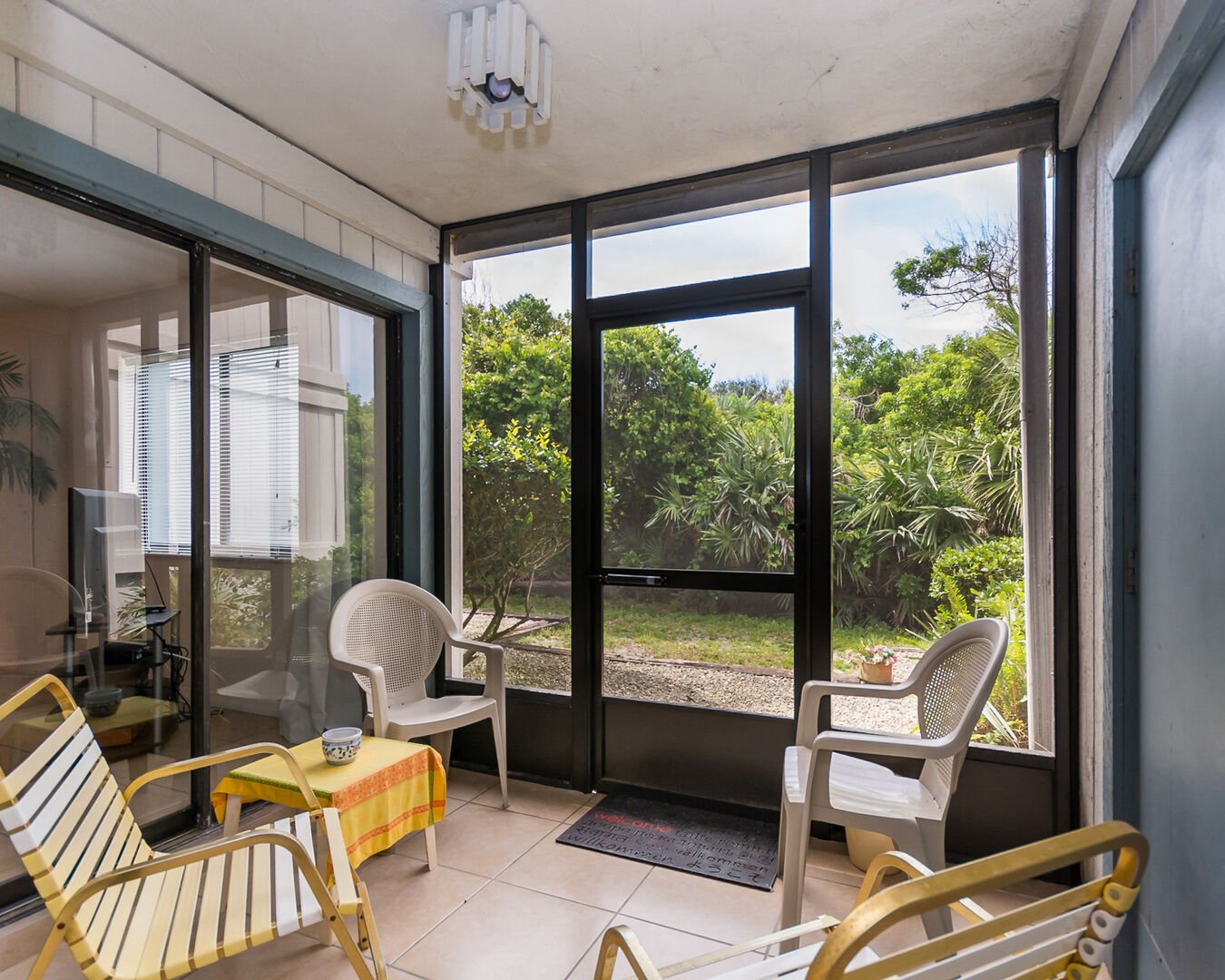 This New Smyrna Beach vacation rental also has a screen in porch!