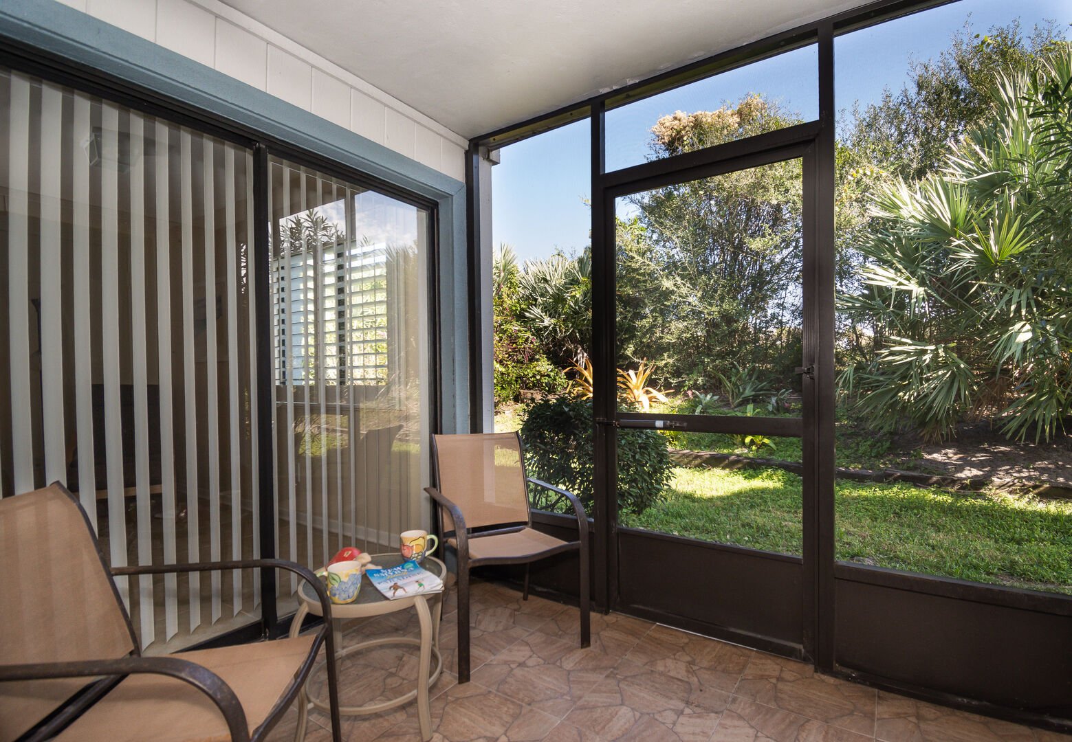 Relax on the screened patio and enjoy the Florida sunshine.