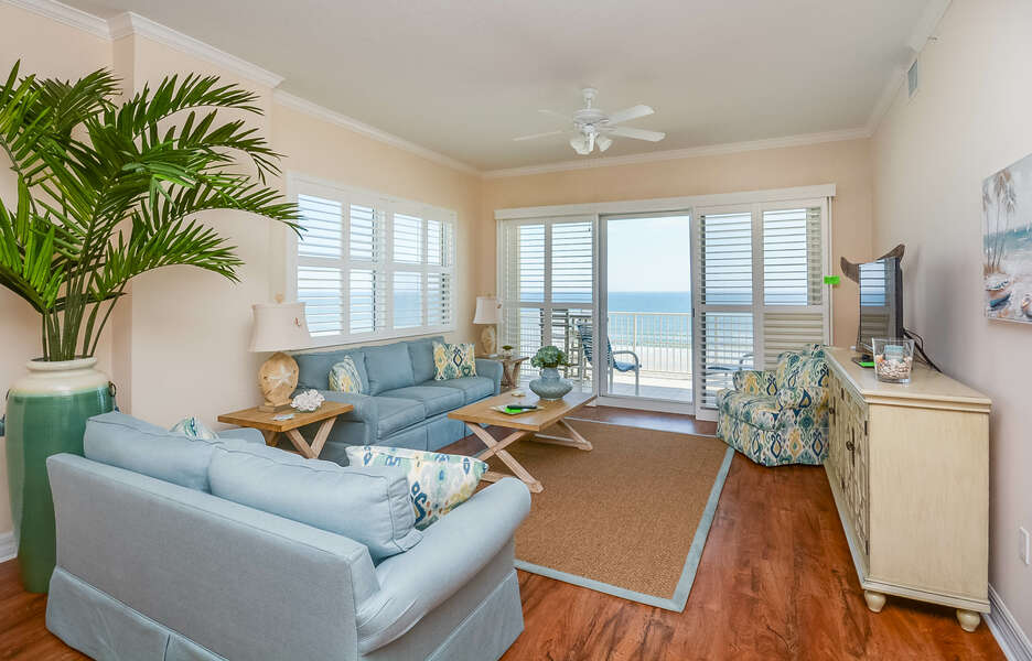Beautiful corner unit with breathtaking view of the beach.