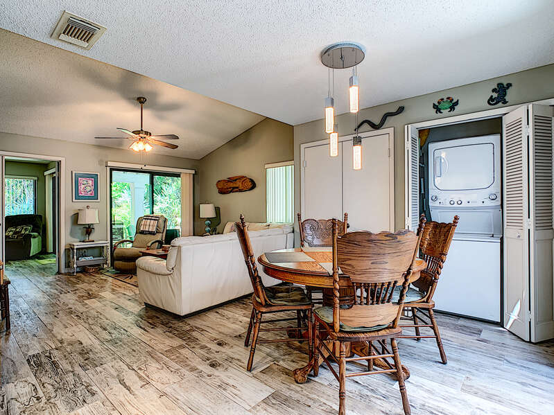 View of the living and dining area at this New Smyrna Beach monthly vacation rental.
