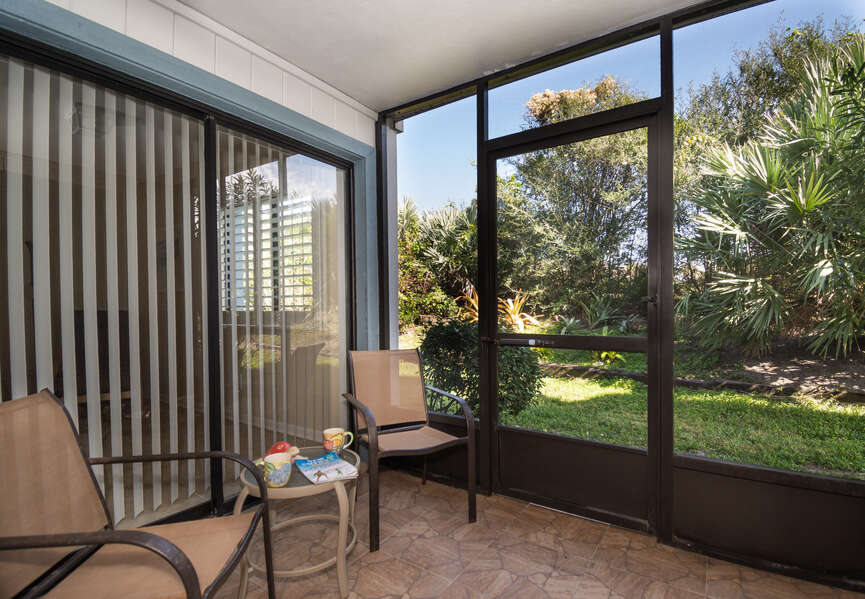 Relax on the screened patio and enjoy the Florida sunshine.