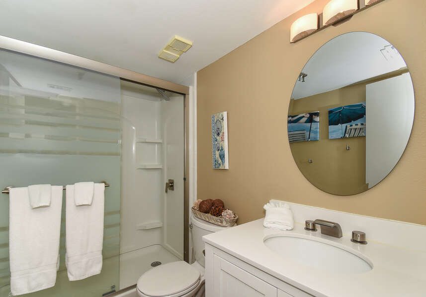 Full Bath with Walk-in Shower and Round Mirror