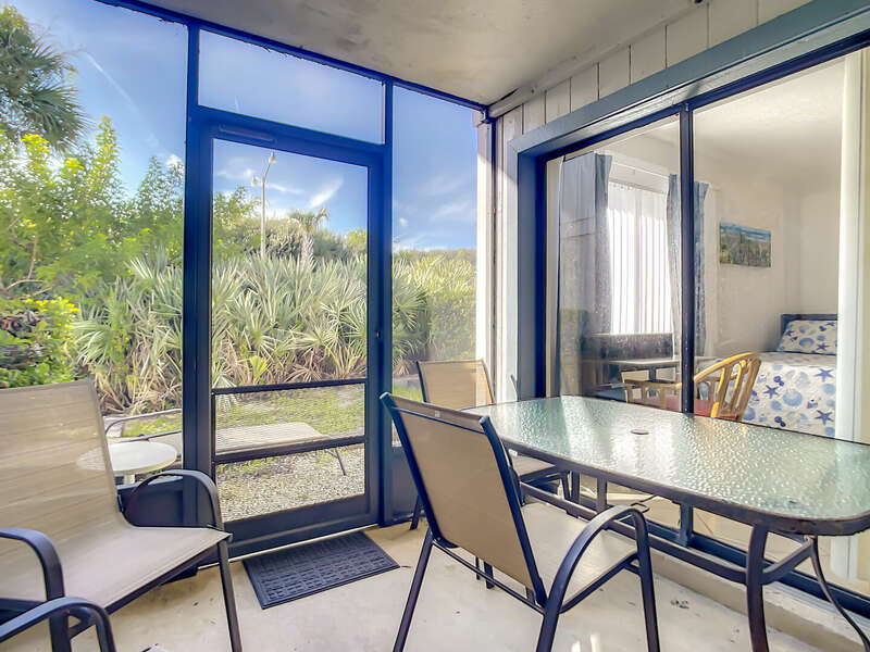 Relax in the Florida sunshine on the screened patio.