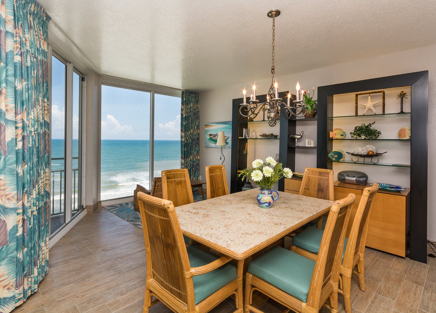 Enjoy meals by the ocean side in the oceanfront living room with seating for 6.