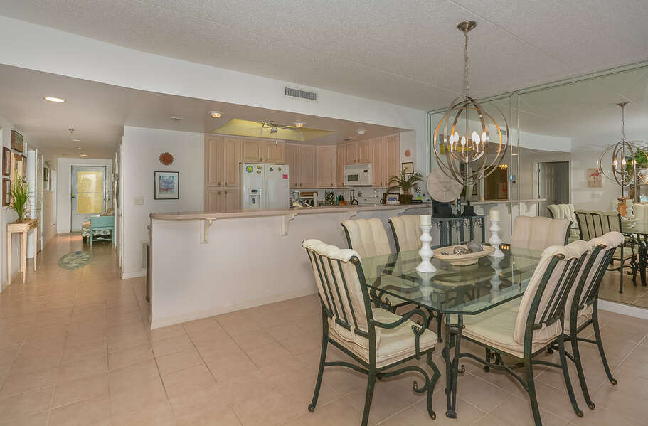 Dining and kitchen area in this New Smyrna Beach condo.