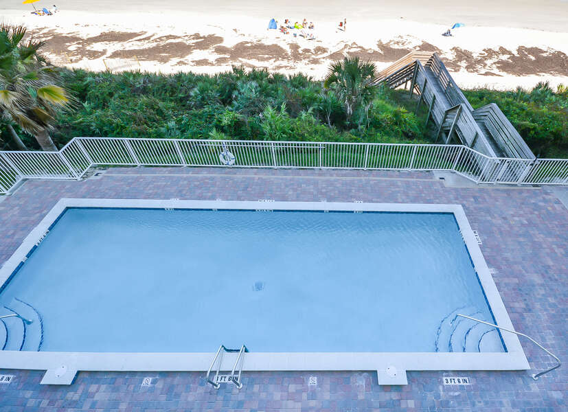 Pool view outside this New Smyrna Beach condo.