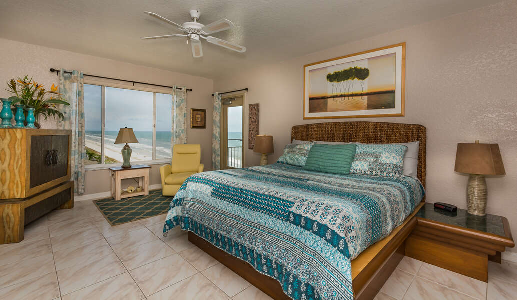 Ocean view master bedroom with access to the oceanfront balcony.